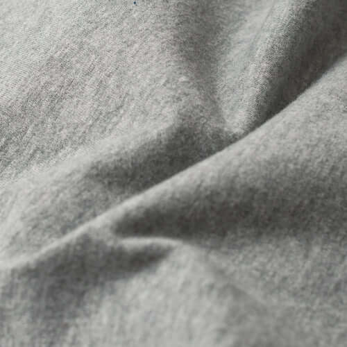 Close-up of soft gray fabric showcasing the quality blend of cotton and polyester for ultimate comfort.