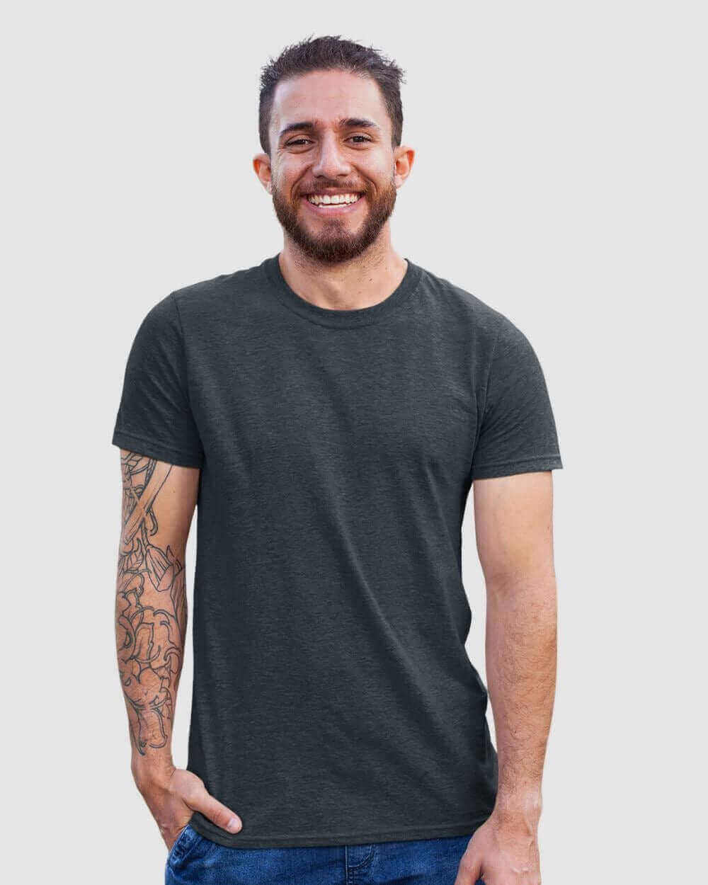 Man smiling while wearing a dark green crewneck t-shirt, showcasing comfort and style.