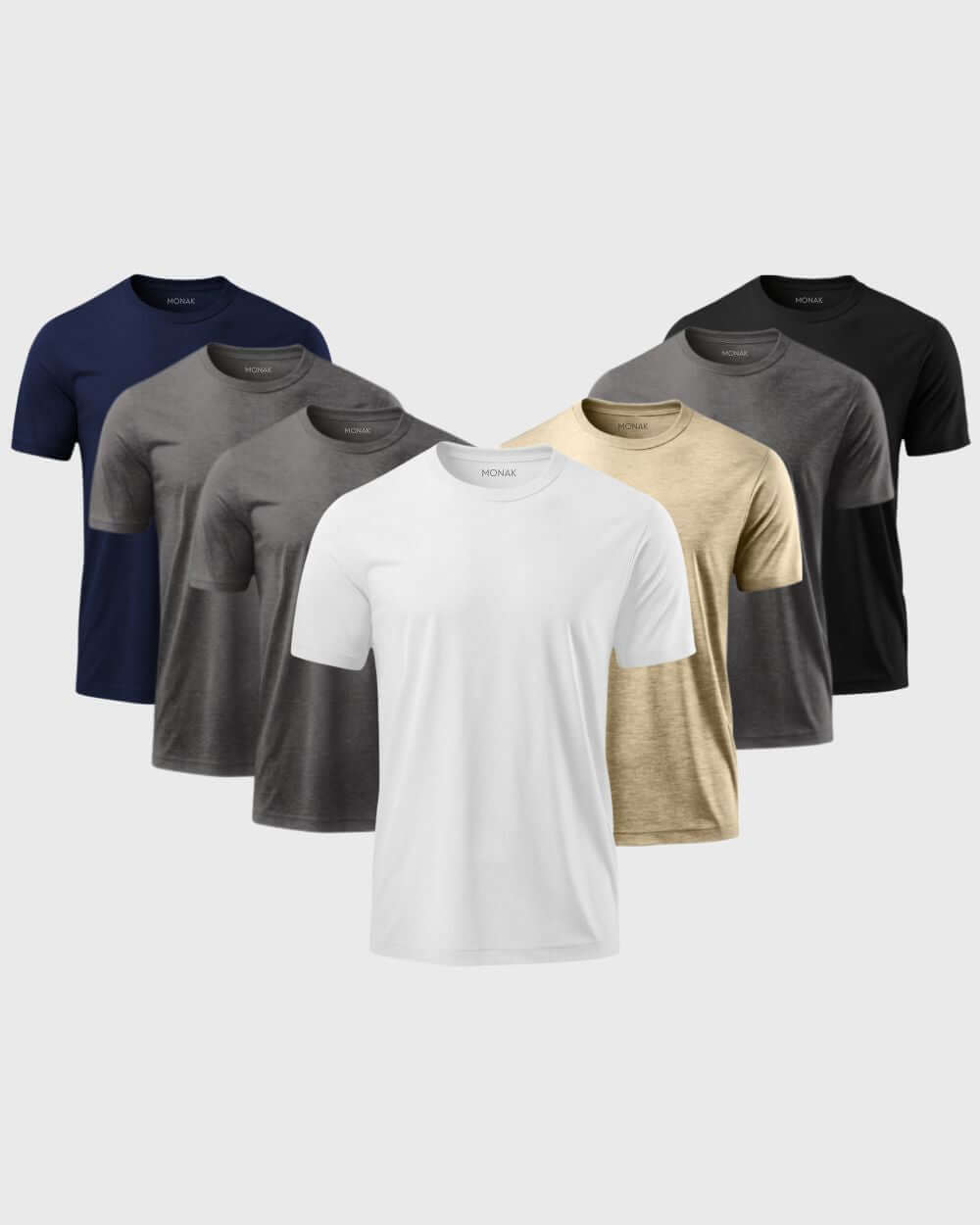 Monak Crewneck 7 pack featuring assorted colors including navy, gray, white, and black, showcasing soft, durable T-shirts.