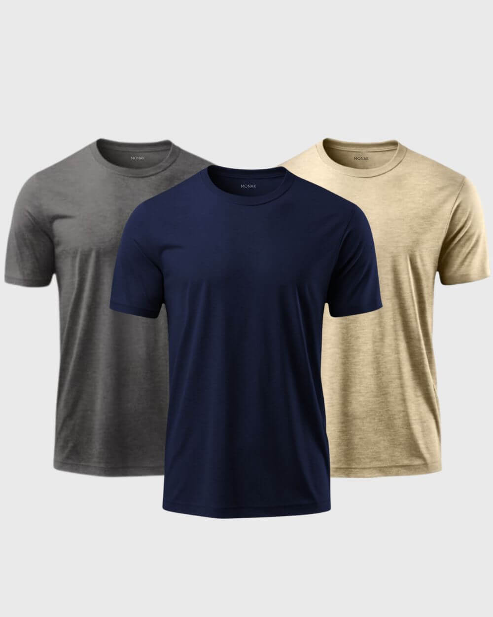 Monak Crewneck 3 pack featuring charcoal, navy, and beige t-shirts in soft, durable fabric for lasting comfort.